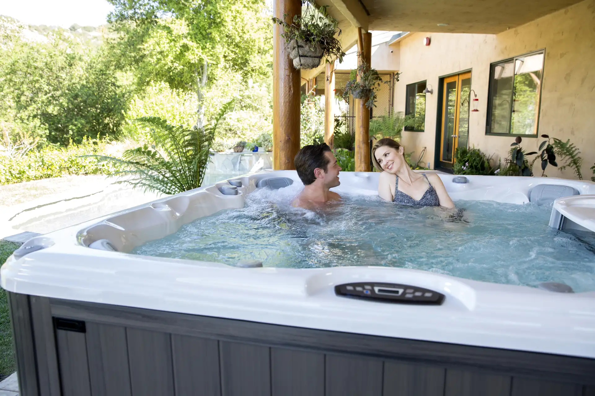 Happy Couple Relaxing In Hot Tub